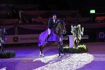 Paul Barker takes the Horse & Country TV Challenge Cup at Horse of the Year Show
